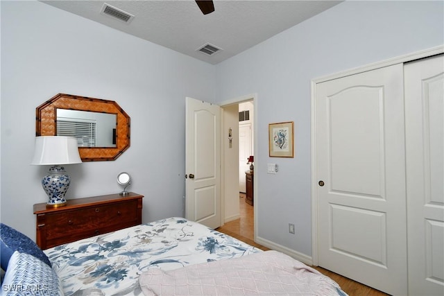 2842 Via Piazza Loop, Fort Myers, FL 33905 - bedroom with baseboards, light wood-style flooring, ceiling fan, and a closet