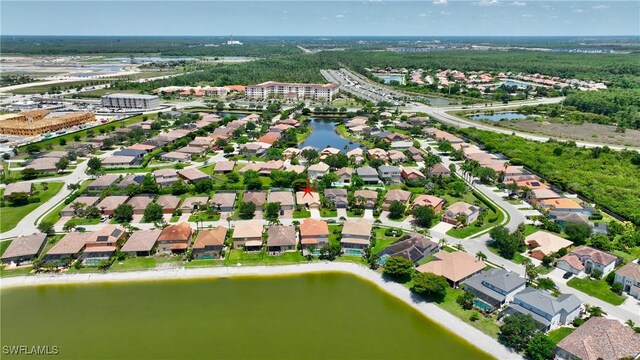 2842 Via Piazza Loop, Fort Myers, FL 33905 - aerial perspective of suburban area featuring a nearby body of water