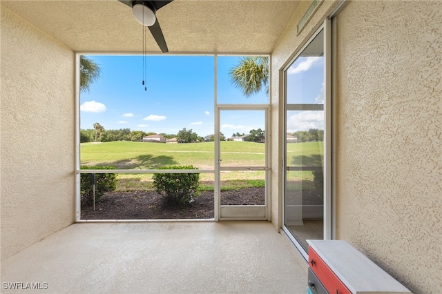 21360 Lancaster Run Unit 1514, Estero, FL 33928 - unfurnished sunroom featuring plenty of natural light and ceiling fan