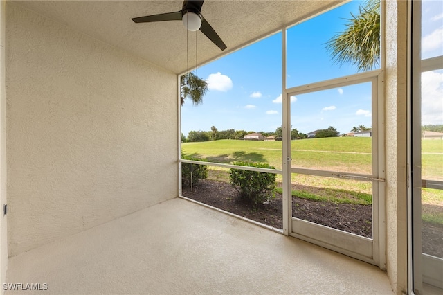 21360 Lancaster Run Unit 1514, Estero, FL 33928 - unfurnished sunroom featuring ceiling fan