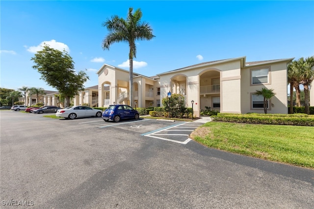 21360 Lancaster Run Unit 1514, Estero, FL 33928 - view of property with uncovered parking