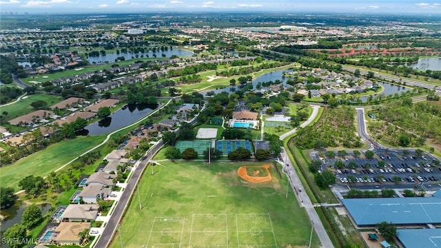 21360 Lancaster Run Unit 1514, Estero, FL 33928 - aerial overview of property's location with a large body of water, a golf club, and nearby suburban area