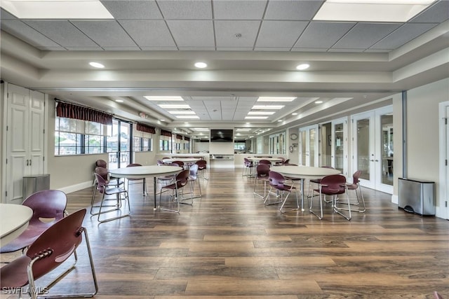 21360 Lancaster Run Unit 1514, Estero, FL 33928 - dining area featuring wood finished floors, french doors, baseboards, and a paneled ceiling