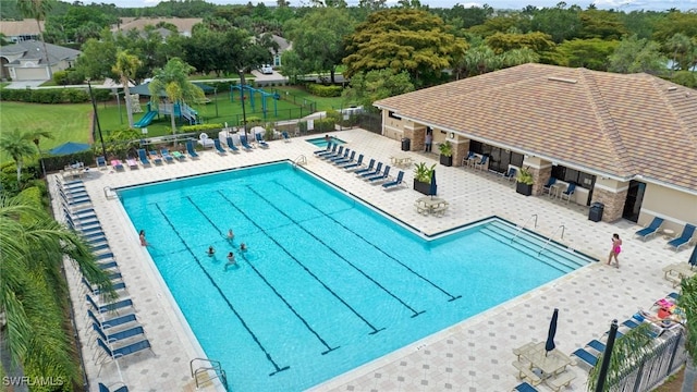 21360 Lancaster Run Unit 1514, Estero, FL 33928 - community pool with a patio area