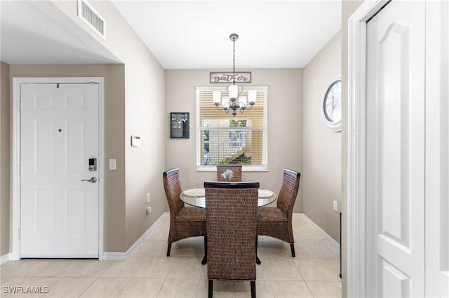 21360 Lancaster Run Unit 1514, Estero, FL 33928 - dining area featuring a chandelier, baseboards, and light tile patterned flooring