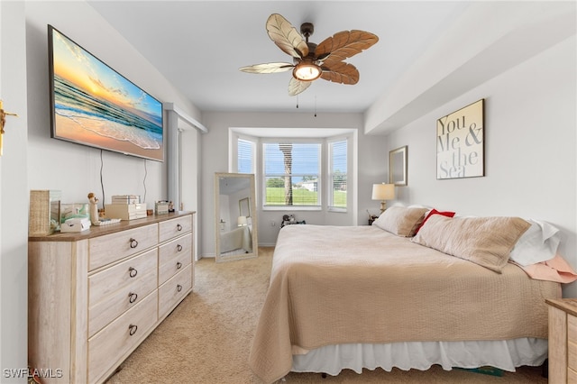 21360 Lancaster Run Unit 1514, Estero, FL 33928 - bedroom with light carpet, ceiling fan, and baseboards