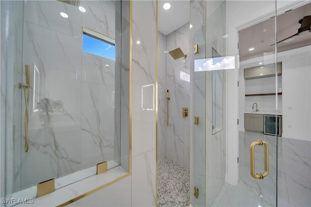 13 NW 14th Ave, Cape Coral, FL 33993 - bathroom with a marble finish shower, a sink, and wine cooler