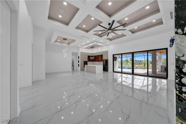 13 NW 14th Ave, Cape Coral, FL 33993 - unfurnished living room featuring light marble finish floors, coffered ceiling, beam ceiling, a high ceiling, and recessed lighting