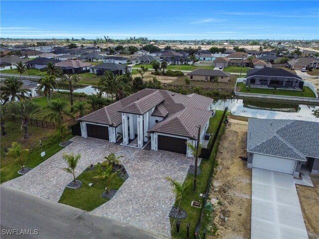 13 NW 14th Ave, Cape Coral, FL 33993 - aerial perspective of suburban area