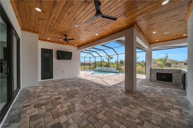 13 NW 14th Ave, Cape Coral, FL 33993 - view of patio featuring ceiling fan, an outdoor pool, area for grilling, and a lanai