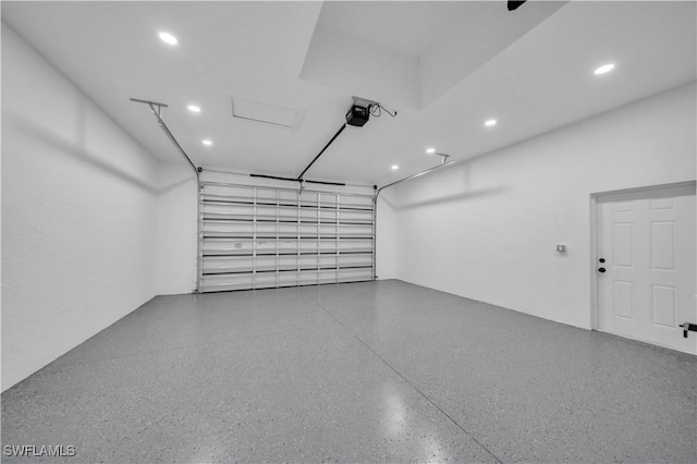 13 NW 14th Ave, Cape Coral, FL 33993 - garage featuring a garage door opener and recessed lighting