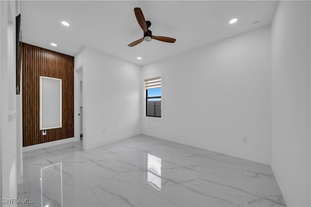 13 NW 14th Ave, Cape Coral, FL 33993 - unfurnished room featuring marble finish floors, ceiling fan, recessed lighting, and baseboards