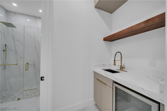 13 NW 14th Ave, Cape Coral, FL 33993 - indoor wet bar with beverage cooler, baseboards, recessed lighting, and light marble finish floors