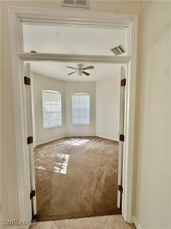 12635 Stone Tower Loop, Fort Myers, FL 33913 - carpeted empty room featuring ceiling fan and baseboards