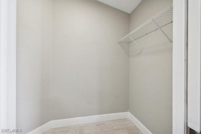 5748 Linden Ln, Bokeelia, FL 33922 - spacious closet featuring light wood-style flooring