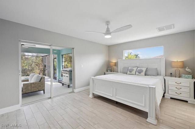 5748 Linden Ln, Bokeelia, FL 33922 - bedroom featuring access to outside, baseboards, light wood-type flooring, and a ceiling fan