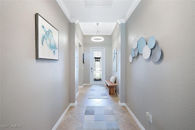 3147 Walnut Grove Ln, Alva, FL 33920 - entryway with crown molding, baseboards, light tile patterned flooring, and a textured wall