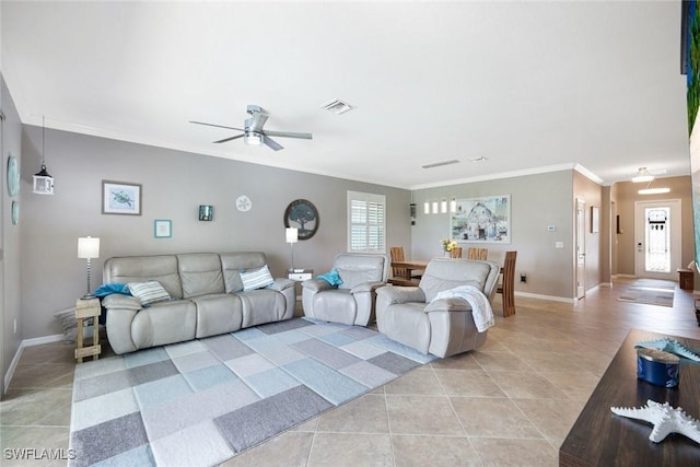 3147 Walnut Grove Ln, Alva, FL 33920 - living room featuring light tile patterned floors, crown molding, a ceiling fan, and baseboards
