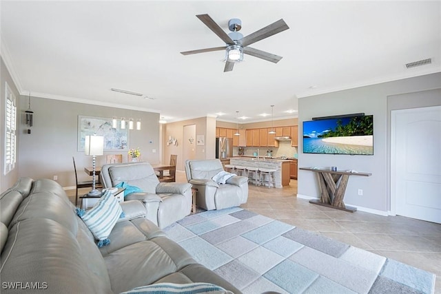 3147 Walnut Grove Ln, Alva, FL 33920 - living room featuring light tile patterned floors, ceiling fan, ornamental molding, and baseboards