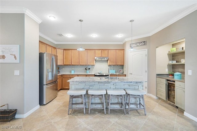 3147 Walnut Grove Ln, Alva, FL 33920 - kitchen featuring stainless steel appliances, beverage cooler, tasteful backsplash, ornamental molding, and a kitchen bar