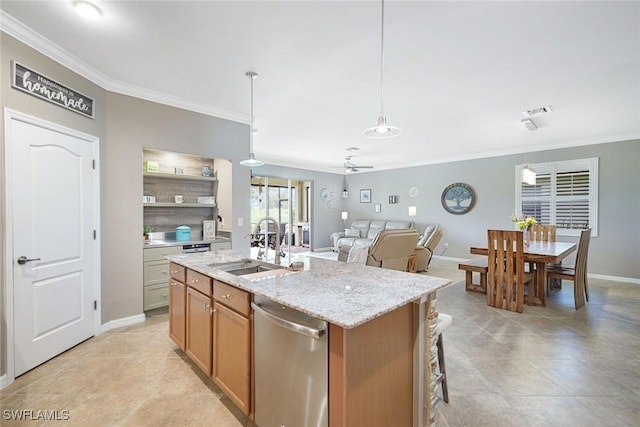 3147 Walnut Grove Ln, Alva, FL 33920 - kitchen with a sink, crown molding, a center island with sink, stainless steel dishwasher, and baseboards