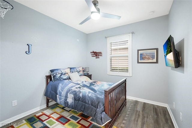 3147 Walnut Grove Ln, Alva, FL 33920 - bedroom with wood finished floors, baseboards, and ceiling fan