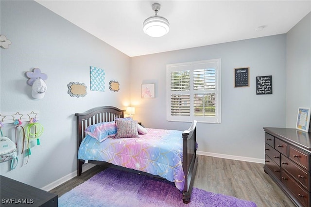 3147 Walnut Grove Ln, Alva, FL 33920 - bedroom featuring wood finished floors and baseboards