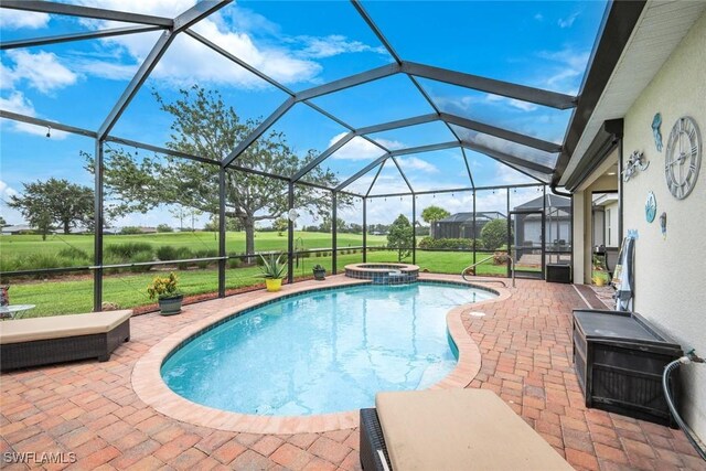 3147 Walnut Grove Ln, Alva, FL 33920 - view of pool featuring a patio area, a pool with connected hot tub, a lawn, and glass enclosure