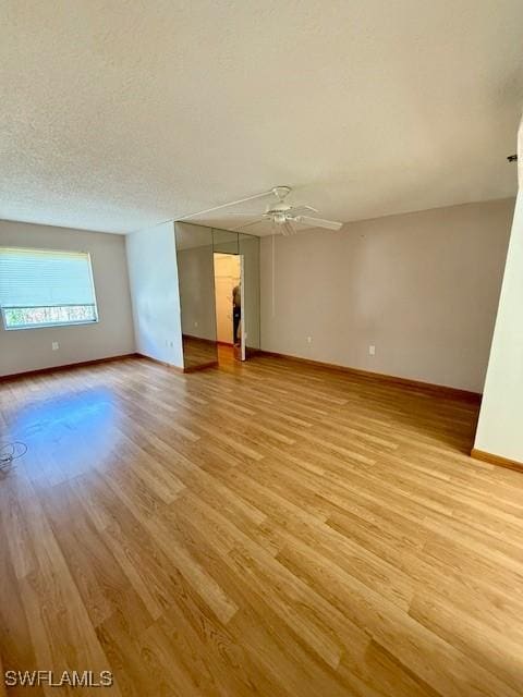 3910 Inverrary Blvd Unit 407-B, Lauderhill, FL 33319 - unfurnished room with light wood-type flooring, ceiling fan, and baseboards