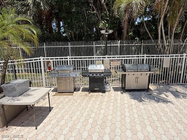 3910 Inverrary Blvd Unit 407-B, Lauderhill, FL 33319 - view of patio featuring grilling area
