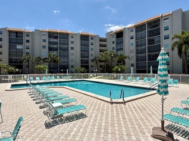 3910 Inverrary Blvd Unit 407-B, Lauderhill, FL 33319 - community pool with a patio area