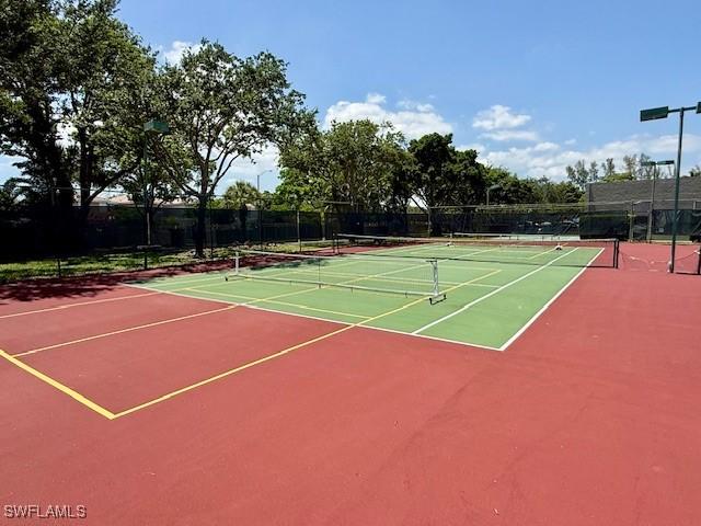 3910 Inverrary Blvd Unit 407-B, Lauderhill, FL 33319 - view of tennis court with community basketball court