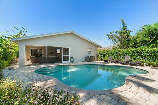 740 106th Ave N, Naples, FL 34108 - view of pool featuring a patio, outdoor lounge area, and central AC