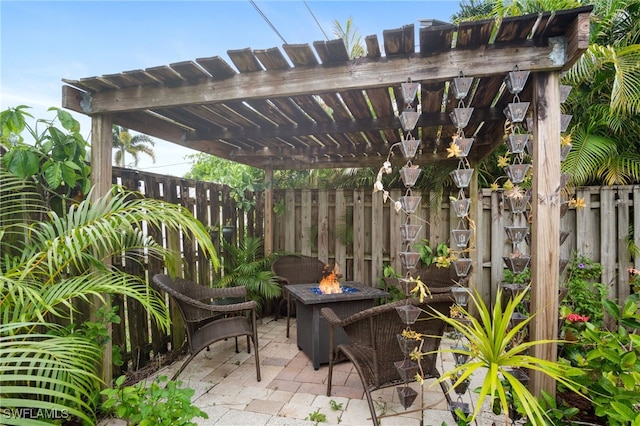 740 106th Ave N, Naples, FL 34108 - fenced backyard featuring an outdoor fire pit, a pergola, and a patio
