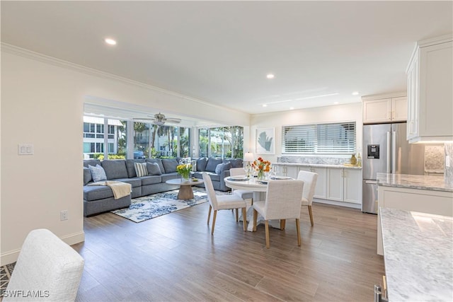 2100 Gulf Shore Blvd N Unit 118, Naples, FL 34102 - dining space with recessed lighting, crown molding, light wood-style flooring, baseboards, and ceiling fan