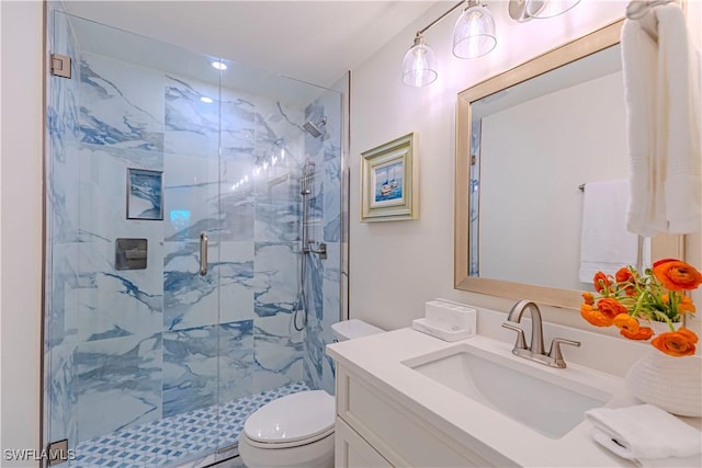 2100 Gulf Shore Blvd N Unit 118, Naples, FL 34102 - bathroom with a marble finish shower, toilet, and vanity