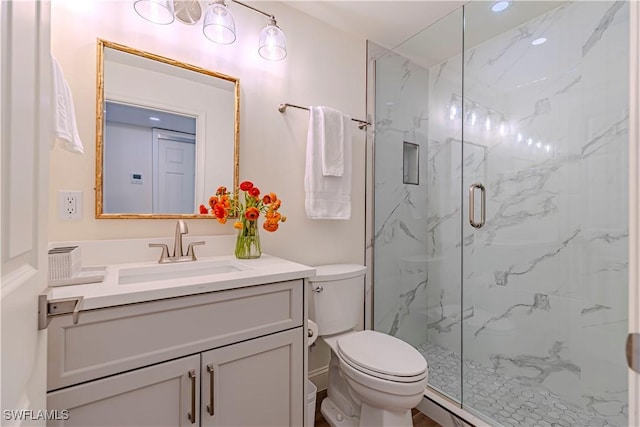 2100 Gulf Shore Blvd N Unit 118, Naples, FL 34102 - bathroom with toilet, a marble finish shower, and vanity