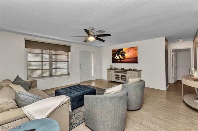 125 Donna Ct, Punta Gorda, FL 33950 - living area featuring ceiling fan, light wood-type flooring, and baseboards