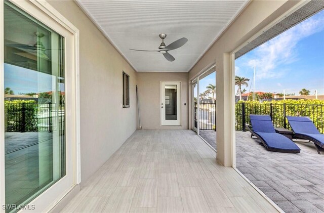 125 Donna Ct, Punta Gorda, FL 33950 - unfurnished sunroom featuring ceiling fan