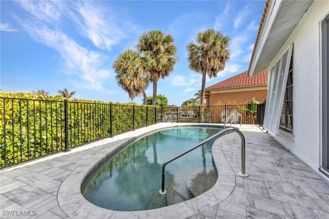125 Donna Ct, Punta Gorda, FL 33950 - view of swimming pool featuring a fenced backyard and a patio area