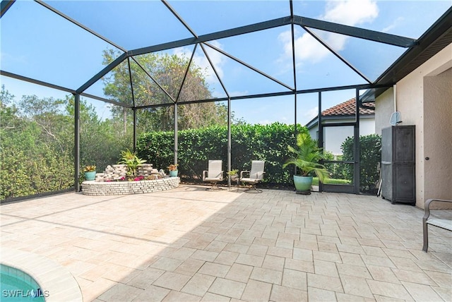 10986 Longwing Dr, Fort Myers, FL 33912 - view of patio / terrace featuring a lanai and an outdoor pool