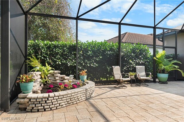 10986 Longwing Dr, Fort Myers, FL 33912 - view of patio / terrace with a lanai