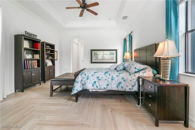 10986 Longwing Dr, Fort Myers, FL 33912 - bedroom with a raised ceiling, crown molding, a ceiling fan, and baseboards
