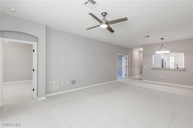 14183 Fall Creek Ct, Naples, FL 34114 - empty room featuring light colored carpet, a ceiling fan, and baseboards