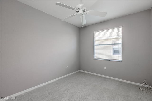 14183 Fall Creek Ct, Naples, FL 34114 - spare room with baseboards, light colored carpet, and ceiling fan