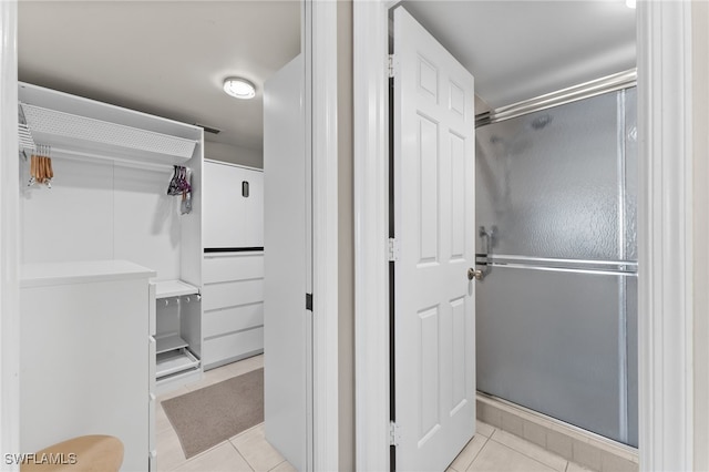 3001 Sandpiper Bay Cir Unit B103, Naples, FL 34112 - full bath featuring tile patterned flooring and a stall shower
