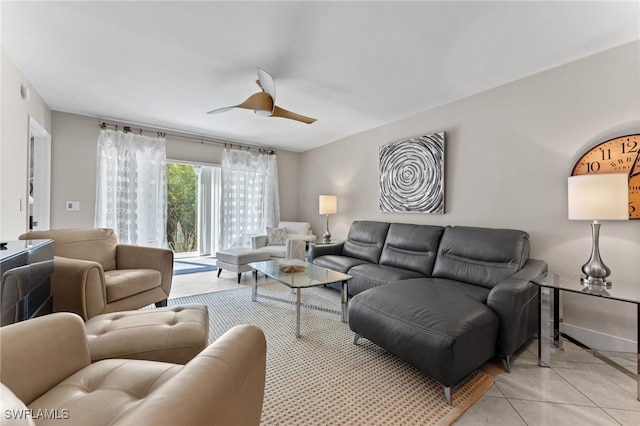 3001 Sandpiper Bay Cir Unit B103, Naples, FL 34112 - living area with light tile patterned floors and ceiling fan