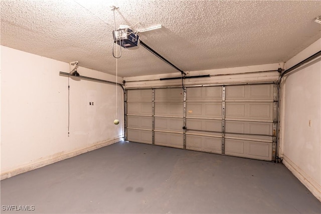 2022 Hunters Trace Cir, Middleburg, FL 32068 - garage featuring a garage door opener and baseboards
