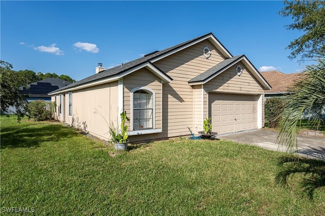 2022 Hunters Trace Cir, Middleburg, FL 32068 - view of front facade featuring a garage, driveway, a front yard, and a chimney