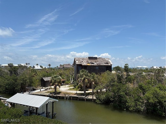 310 Pieces Of Eight, Captiva, FL 33924 - dock featuring a water view